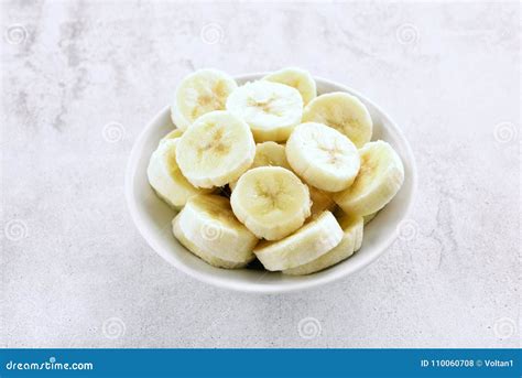 Sliced Peeled Banana In Bowl Stock Photo Image Of Ripe Dessert