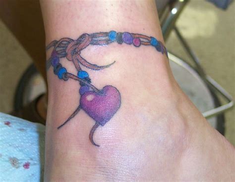 Black feather ankle bracelet tattoo. Bracelet Tattoo Designs for Girls ~ Say 24