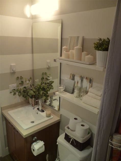 Don't let a small bathroom put you in a design dilemma. A basket is a great way to store extra toilet paper in a ...