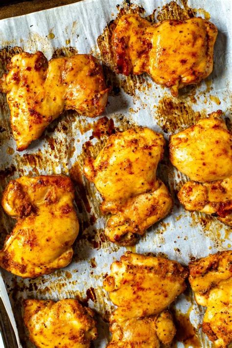 Add the olive oil and the spices and use your hands to coat the chicken pieces with the oil and spices. Perfect Baked Chicken Thighs (Bone-In and Boneless) - The ...