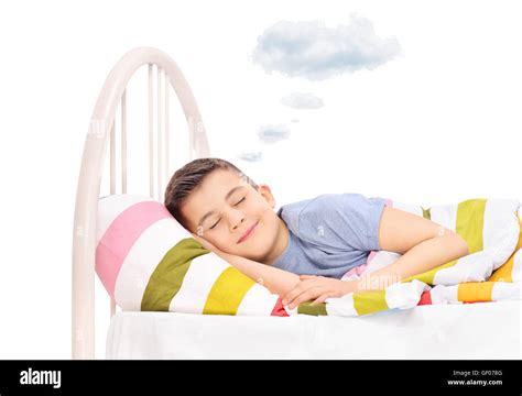 Happy Boy Sleeping And Dreaming Sweet Dreams With A Cloud Above His