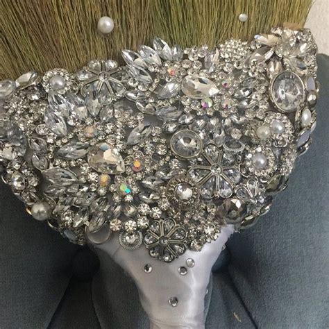 Featuring a beautiful selection of wedding decorations, invitation supplies, gift and favor supplies, photo booth props and more! Wedding Broom -Brooch Bling 'The Sarah O' Bling Jumping Broom- Bling Broom in 2020 | Wedding ...