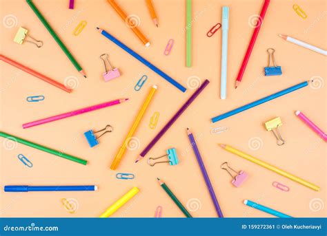 Colorful School Supplies On A Orange Background Back To School Concept