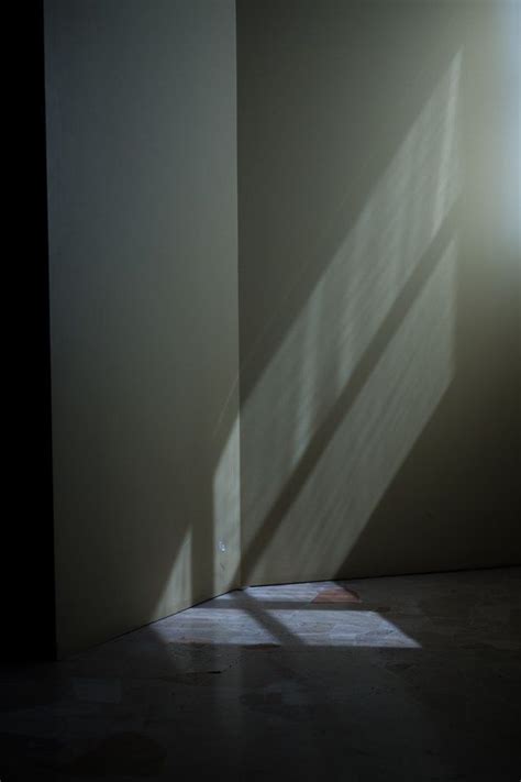 Shadows On A Wall From Light Coming Through A Window Light And