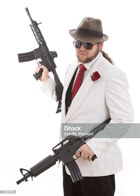 Man Holding 2 Guns Stock Photo Download Image Now Istock