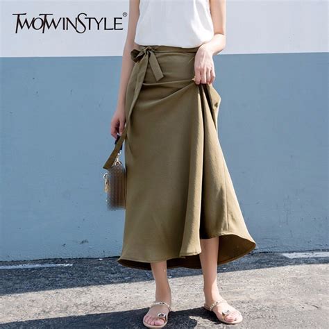 Twotwinstyle Bowknot Skirt For Women High Waist Lace Up Hem Waves Long Skirts Summer Female 2018