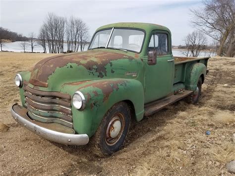 Truck tailgate bench for sale made from recycled salvage and reclaimed wood seat. Original 1953 Chevrolet Pickup farm truck with patina for sale