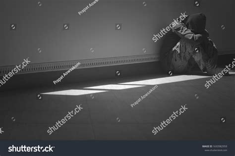 Side View Hopeless Man Sitting Alone Stock Photo 1693982959 Shutterstock