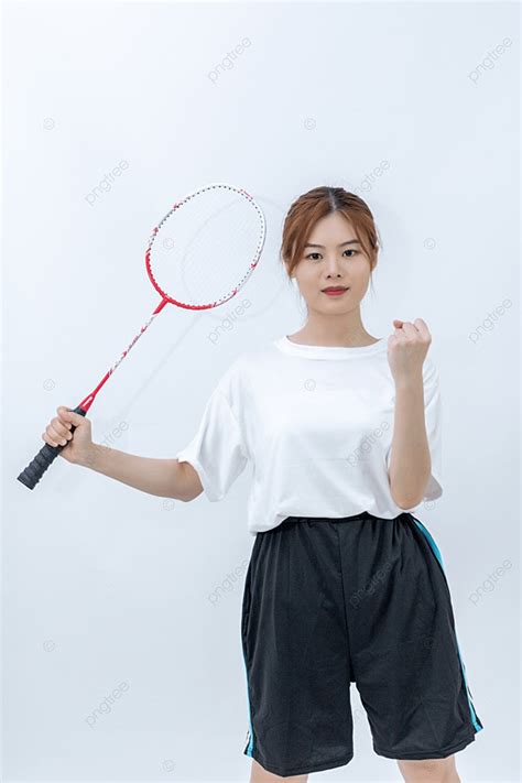 Athletic Female Holding Badminton Racket In Studio To Cheer Sports