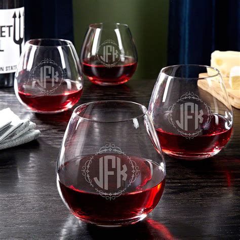 Clear wine glass is presented without the stem and holds 9 oz. Wedding Monogram Stemless Wine Glasses Set of 4