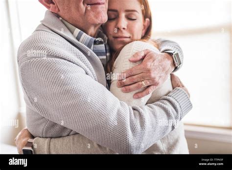 Hug Mother Father Adult Daughter Hi Res Stock Photography And Images