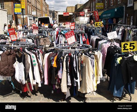 Racks Of Clothes Market Stall Petticoat Lane Stock Photo Alamy