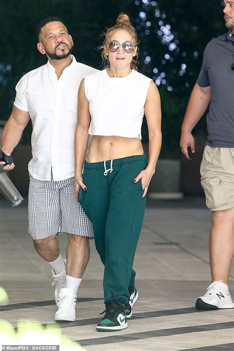 Jennifer Lopez Puts Her Sculpted Abs On Display In White Crop Top In