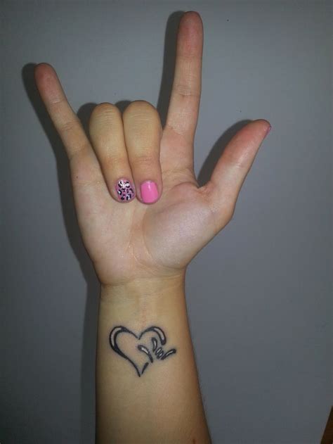 It comes in a range of skin tones. i love you | Sign language tattoo, I love you signs, Tattoos