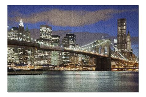 New York City Ny Skyline And Brooklyn Bridge At Night