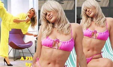 Pussycat Dolls Ashley Roberts Almost Spills Out Of Hot Pink Bikini As She Flexes Her Legs
