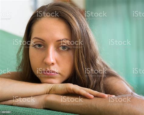 Depressed Woman On Sofa Stock Photo Download Image Now 20 29 Years
