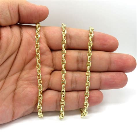 Maybe you would like to learn more about one of these? 10K Yellow Gold Hollow Puffed Mariner Chain 26 Inch 5mm