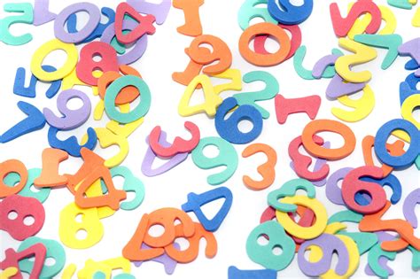 Free Stock Photo 6969 Colourful Numbers Scattered On White Freeimageslive