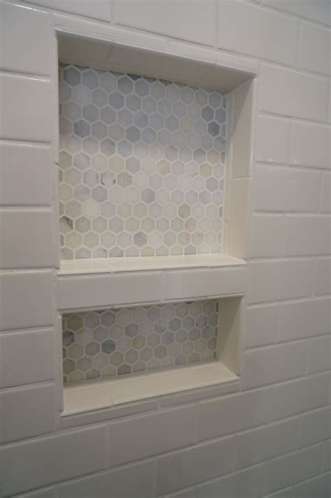 Or choose border tiles to add decorative flair to your space. Shower Niche Tiled shower renovation | Bathroom storage ...