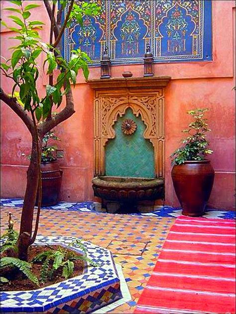 Moroccan style bathroom with an arch reflected in the mirror for creating an effect. 100 Moroccan Home Decor Ideas 7 | Moroccan home decor ...