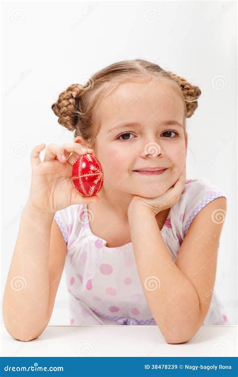 Little Girl Showing A Traditional Decorated Easter Egg Stock Image