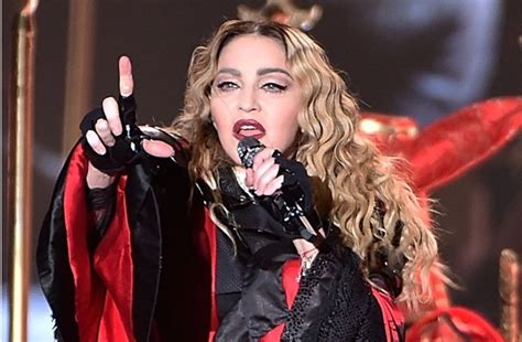 Madonna struggles to walk after fall during Paris concert