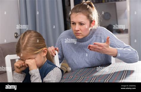 Serious Mother Scolding Her Daughter Stock Photo Alamy