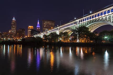 The Cleveland Skyline With The Veterans Memorial Bridge Photograph By