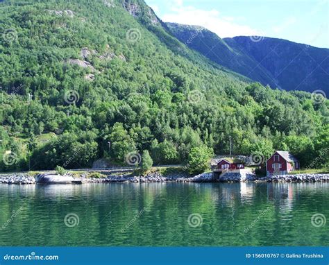 Houses Norwegian Village Water Forest Fjord On A Sunny Day Tourism