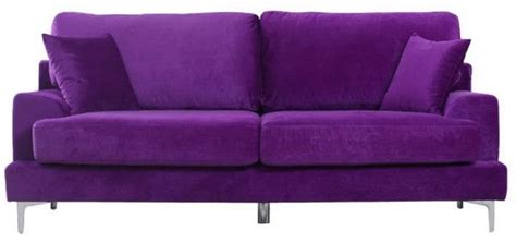A Purple Couch With Two Pillows On It