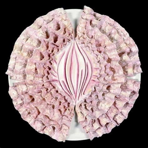 Around an equilateral triangle table, she crafted elaborate place settings for 39 female figures from the history of western civilisation, beginning with the primordial goddess and ending with georgia o'keeffe. Brooklyn Museum: Emily Dickinson
