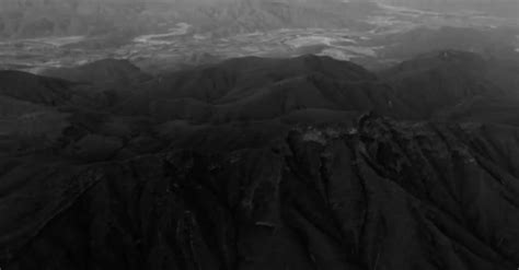 Drone Footage Of A Mountain In Black And White Color Free Stock Video