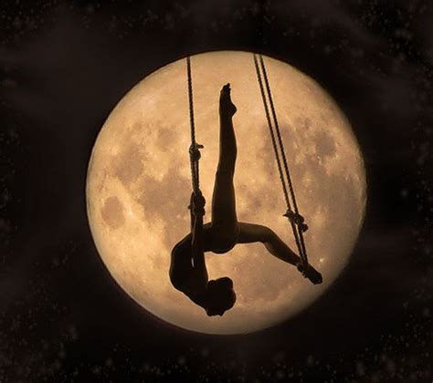 A Moon Lit Circus Performer Silhouette Aerial Acrobatics Aerial Dance