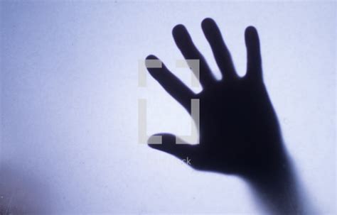 A Hand Pressing Against Glass — Photo — Lightstock