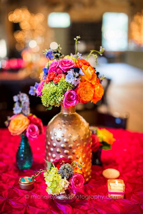 From red to purple to rainbow flowers, search wedding flowers by color and quickly see what your choices are. Centerpieces. Wedding Reception. Gold vase. Hot pink ...