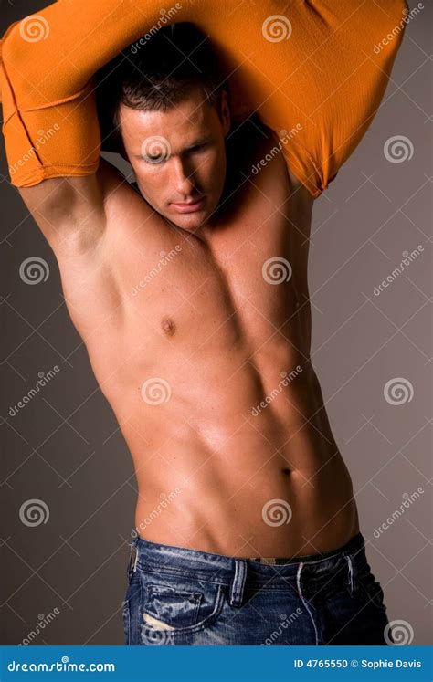 Man Pulling Off T Shirt Stock Photo Image 4765550