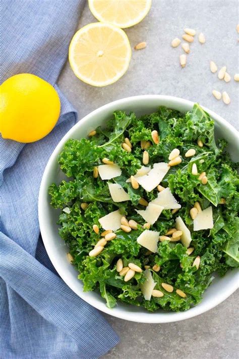 this lemon parmesan kale salad with toasted pine nuts is our favorite easy kale salad it is