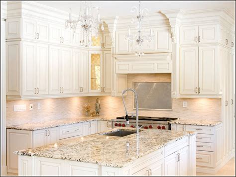 I would like to choose a tile backsplash and new wall colour and was thinking earthy tones. kitchen cabinet off white - Google Search | Antique white ...