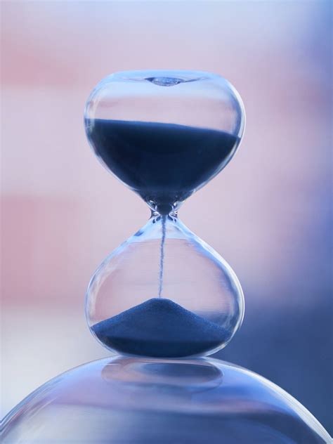 Download Hourglass Clock Filled With Sand Wallpaper