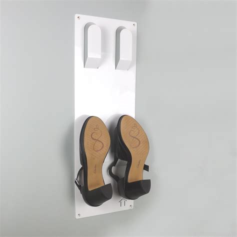 Your wall decoration ideas make the rules with this wood tray. Slimline Wall Mounted Metal Shoe Rack - White