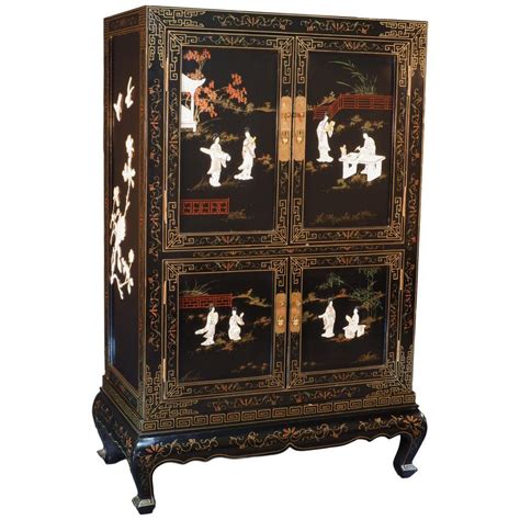 Chinese Black Lacquer Cabinet With Shell And Bone Embellishment