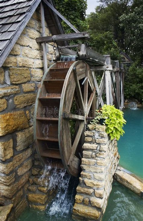 Water Wheel Water Flows Over Wheel Of Old Wood And Stone Mill