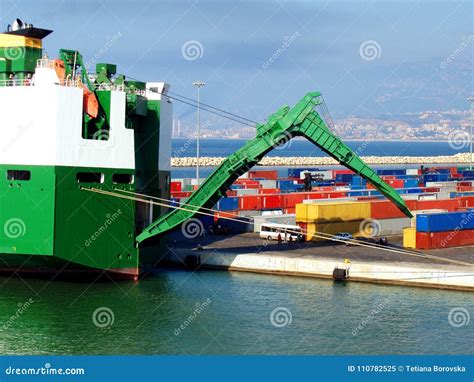 Cargo Ship Unloading Freight Ship Unloading In Port Stock Image