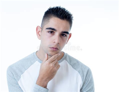 Close Up Portrait Of Sad Young Man Face Suffering From Depression