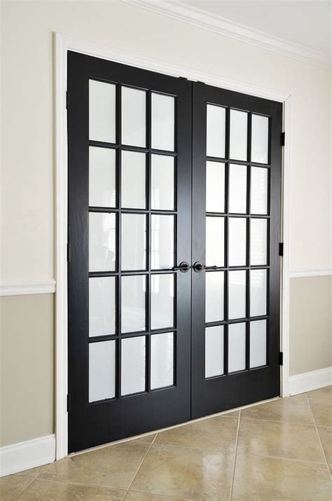 Before you start painting, you'll have to clean, sand, and prime your door. painted black interior french doors with privacy film ...
