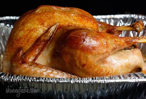 Put the turkey on a roasting pan. How to Roast a Brined Turkey | Skinnytaste