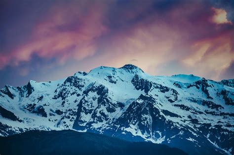 Mountain Peak Snow Over Purple Sunset Sky Photos Free And Royalty Free