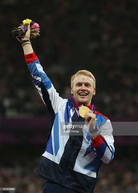 Gold Medalist Jonnie Peacock Of Great Britain Poses On The Podium