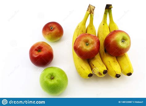 The Meeting Of Apples And Bananas On A White Background Stock Image